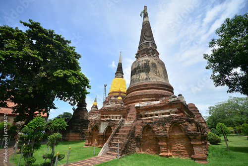 Old brick temple and statue of buddha. Historical national park, Ayuthaya, Thailand