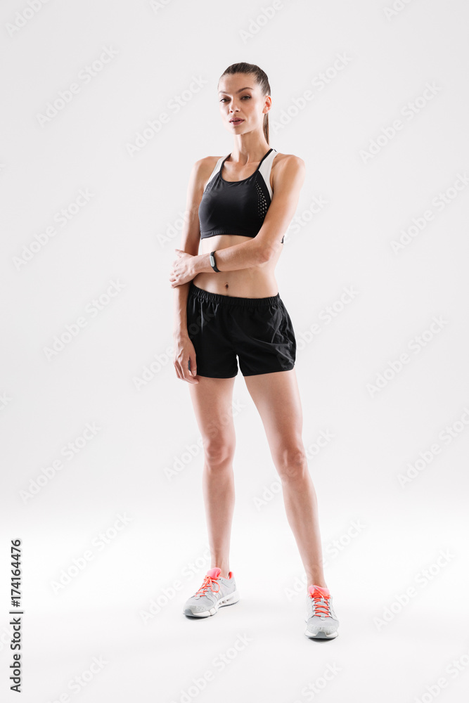 Full length portrait of a young fit sportswoman posing Full length portrait of a young fit sportswoman posing