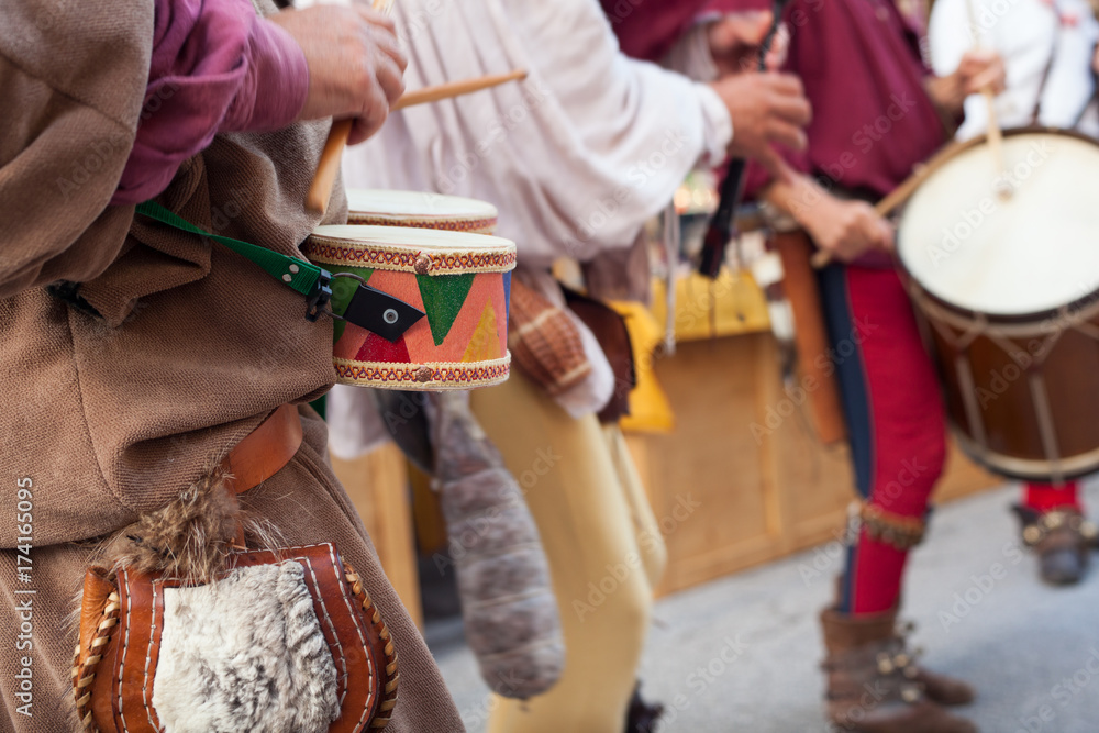 Historical drummers dressed in ancient clothes