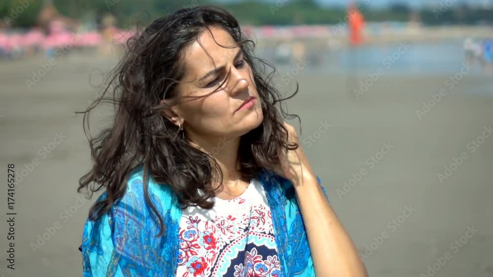 Pretty woman looks sad and standing on the beach, slow motion shot at 240fps, steadycam shot
Pretty woman looks sad and standing on the beach, slow motion shot at 240fps, steadycam shot