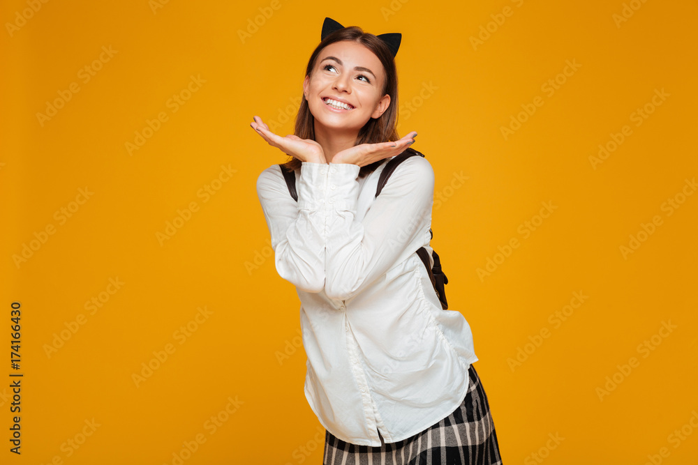 Portrait of a lovely smiling schoolgirl with backpack Portrait of a lovely smiling schoolgirl with backpack