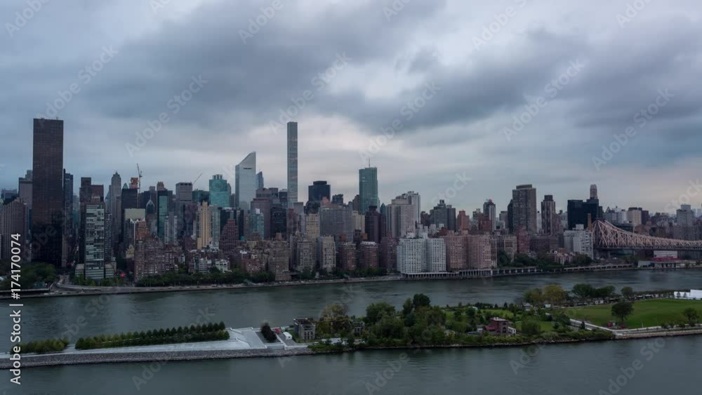 Midtown Manhattan Skyline and East River Day to Night Sunset Timelapse Midtown Manhattan Skyline and East River Day to Night Sunset Timelapse