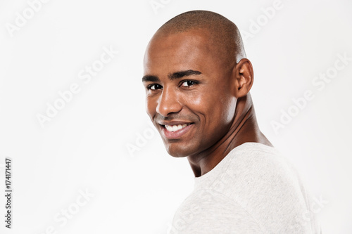 Handsome smiling young african man