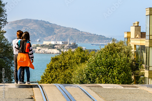 tourists observing alcatraz island in san francisco