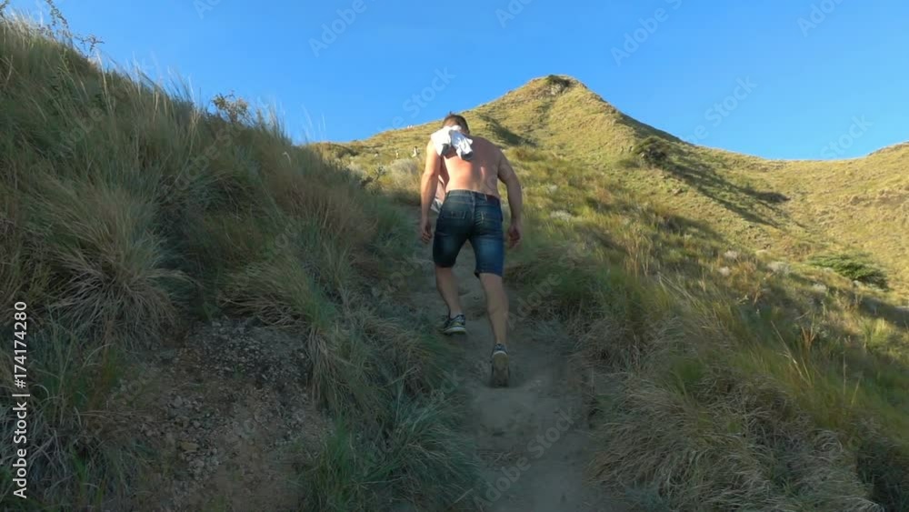Man walking on the mountain on a hot day, slow motion shot at 240fps, steadycam shot
Man walking on the mountain on a hot day, slow motion shot at 240fps, steadycam shot