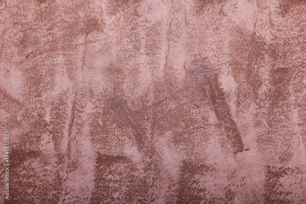 Fototapeta premium Textured plaster on the wall. Abstract brown background