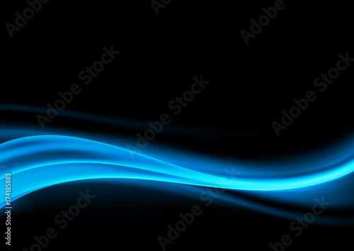 Abstract blue swoosh smoke wave design element over dark background
