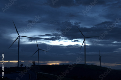 Wind turbines farmland for generating electricity in Southeast Asia.