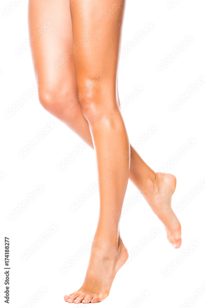 Beautiful female legs after depilation isolated on white background Beautiful female legs after depilation isolated on white background