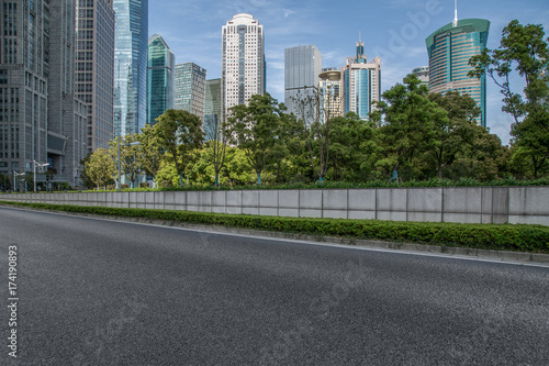 urban traffic road with cityscape in background in Shanghai,China..