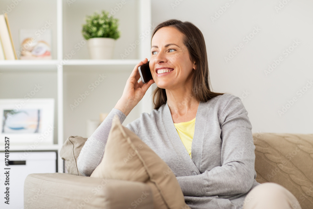 happy woman calling on smartphone at home happy woman calling on smartphone at home