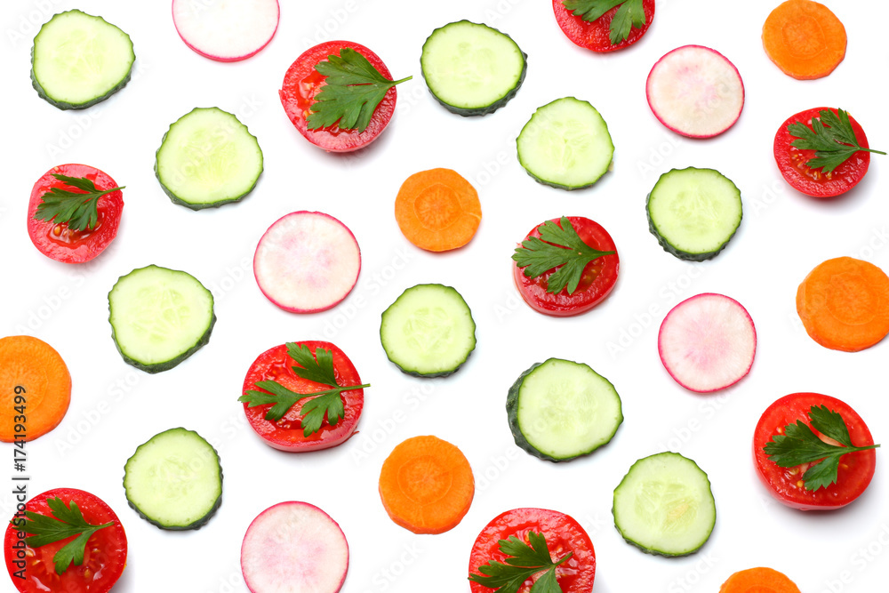 mix of sliced cucumber with sliced carrot and tomato isolated on a white background top view mix of sliced cucumber with sliced carrot and tomato isolated on a white background top view