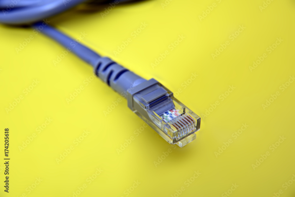 Cable network connection isolated on a white background. An Ethernet RJ45 cable Cable network connection isolated on a white background. An Ethernet RJ45 cable