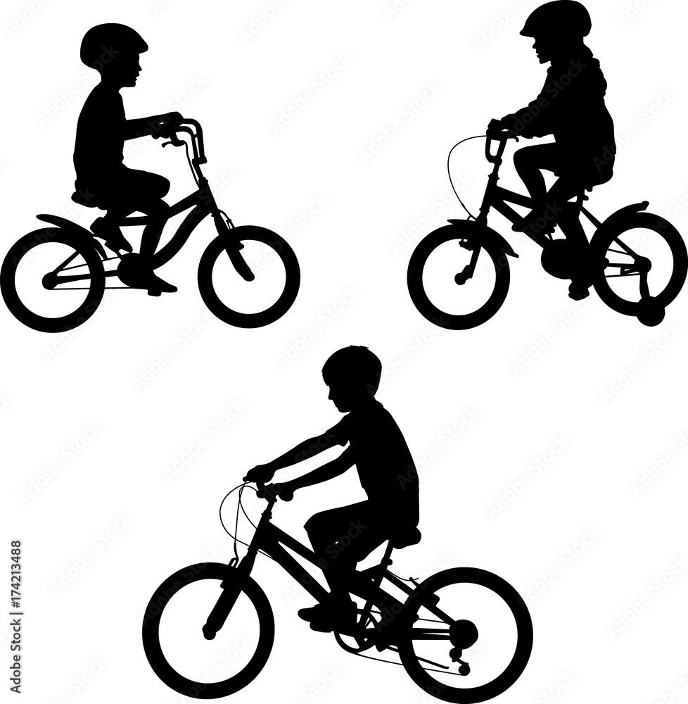 Fototapeta premium kids riding bicycles silhouettes - vector