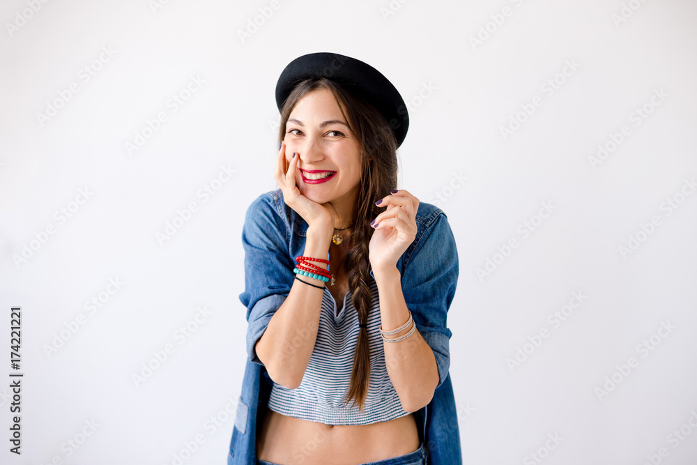 Portrait of smiling showing teeth young woman with hat Portrait of smiling showing teeth young woman with hat