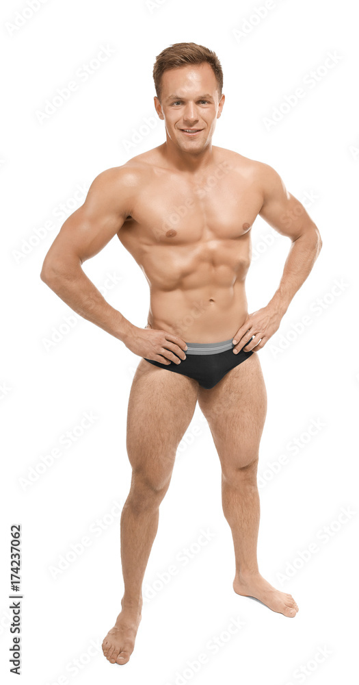 Muscular man in underwear on white background