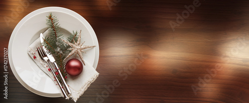 Festive table decoration for a christmas dinner photo