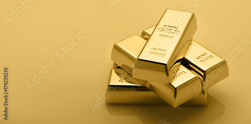 Gold bullion stack. Set of gold bars. photo