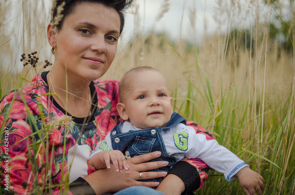Mother holding sweet baby boy