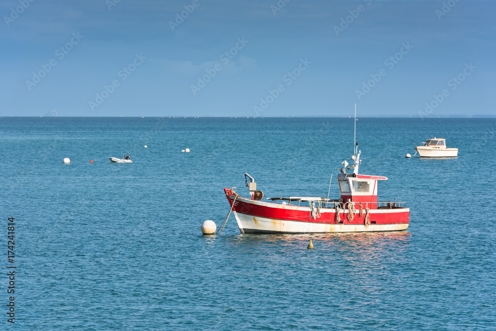 Bright blue sea and fisherman boats