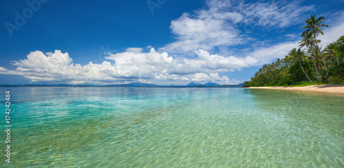 Panoramic view of tropical beach on background the islands