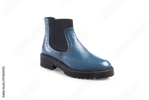 Blue suede boot isolated on white background.