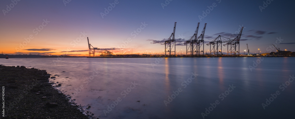 Southampton Docks viewed from Marchwood at sunset.