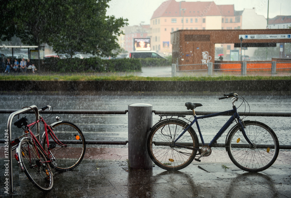 bicycles on wet rainy street in Berlin city. germany