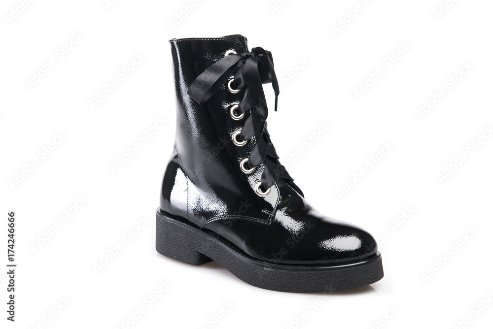Black suede boot isolated on white background. Black suede boot isolated on white background.
