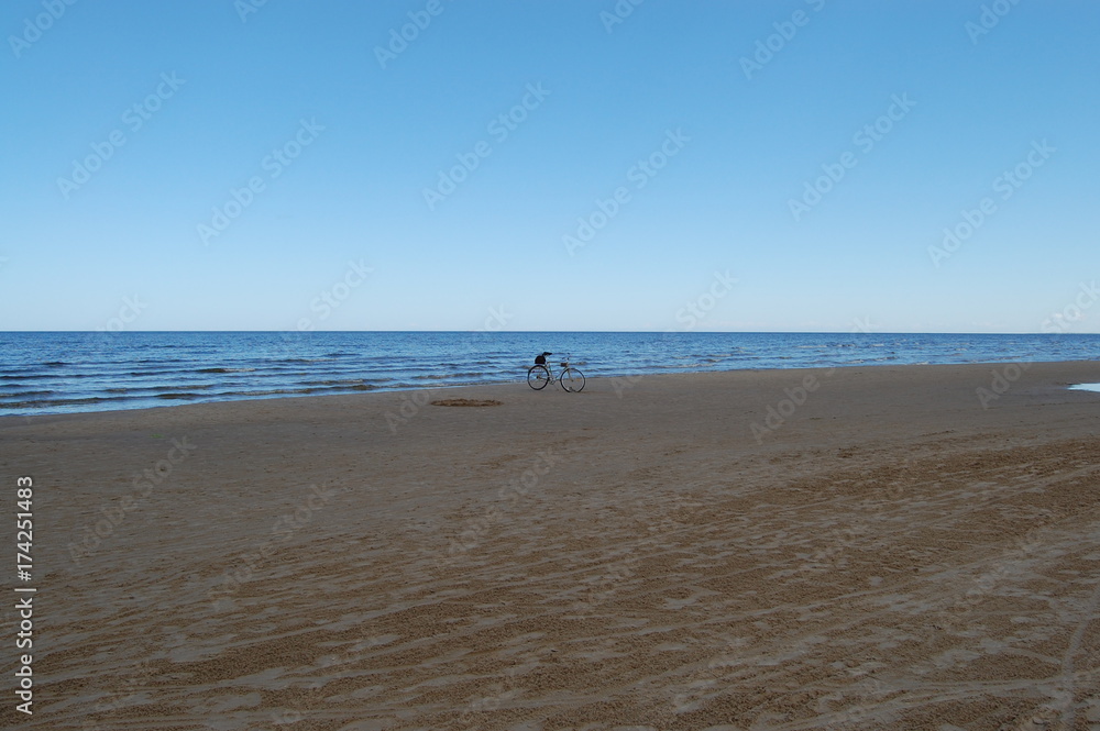 Bike on a deserted beach. Latvia, Jurmala