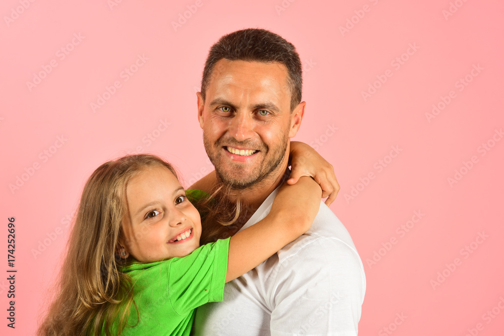 Daughter and father hug each other. Schoolgirl and her dad Daughter and father hug each other. Schoolgirl and her dad