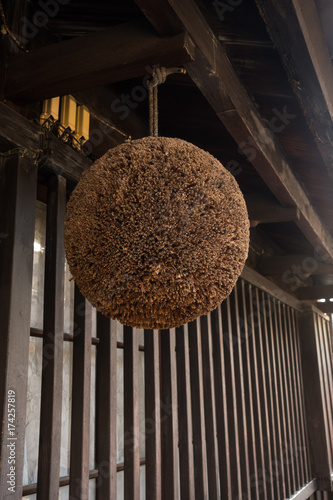 Sugitama (Cedar leaf ball) in front of an old alcohol factory at Fushimi in Kyoto, Japan photo