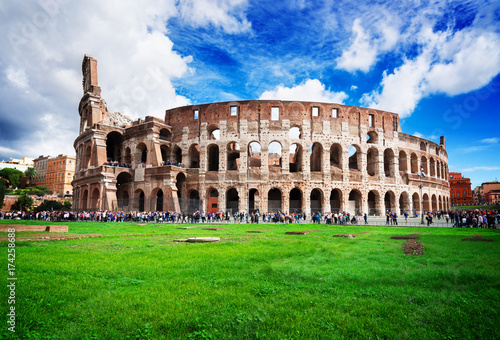 Photography ruins of antique Colosseum building at spring day in Rome Italy, retro toned