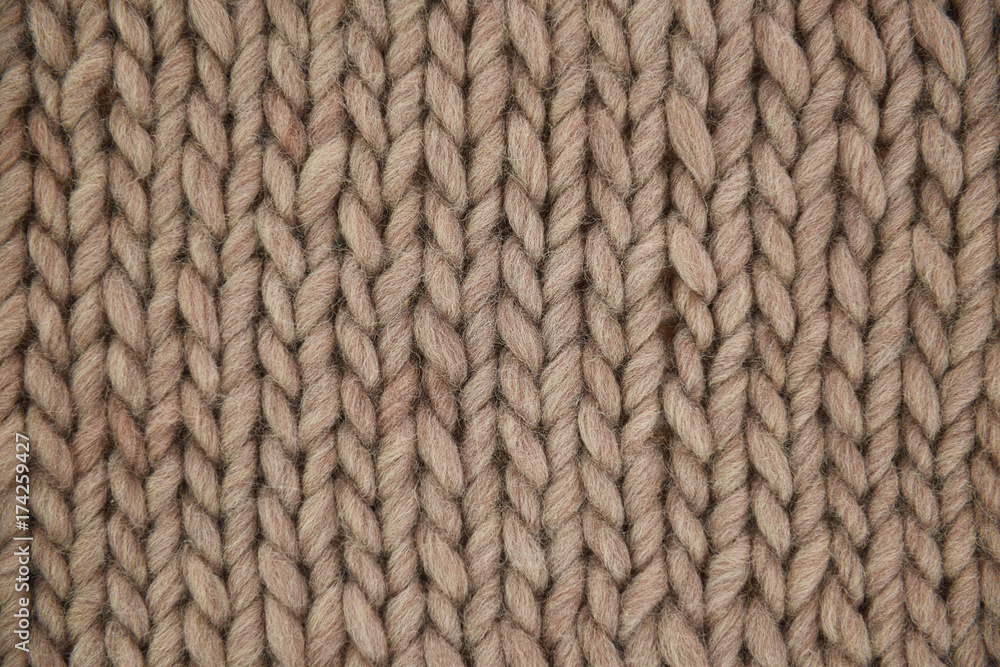 Hand knit woolen texture in full frame Hand knit woolen texture in full frame