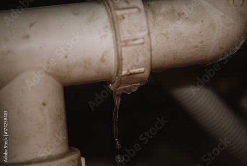 real Leakage Of Water From Pipe on home background