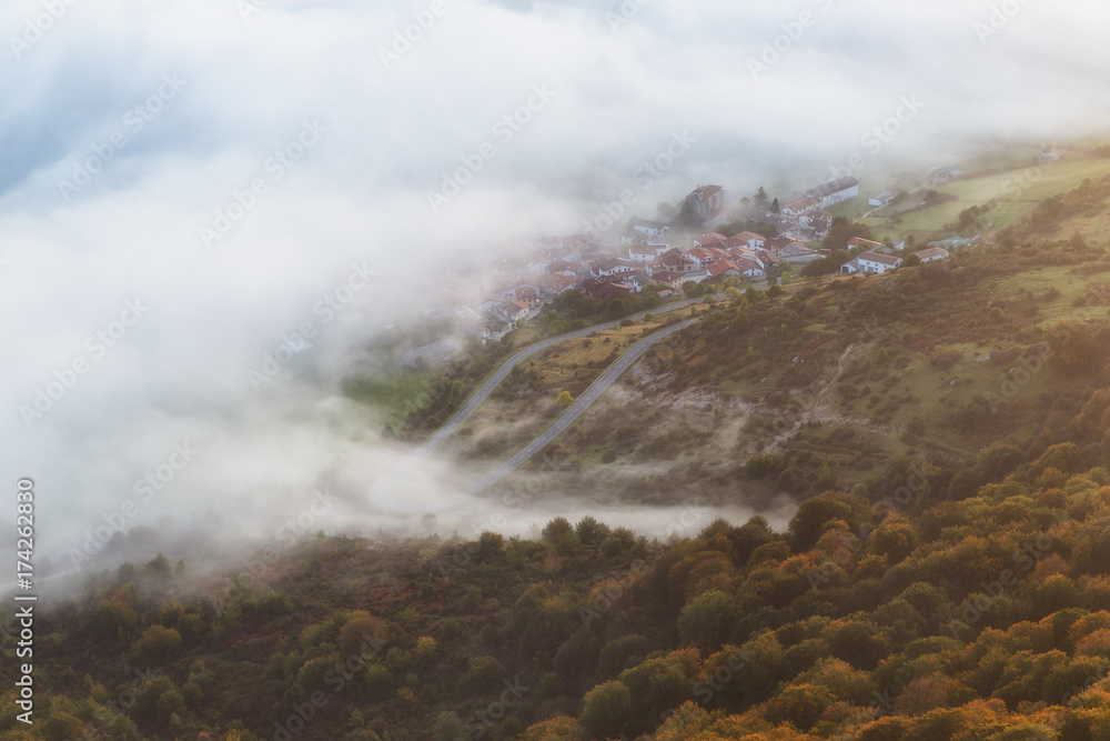 Lizarraga village round by fog and forest