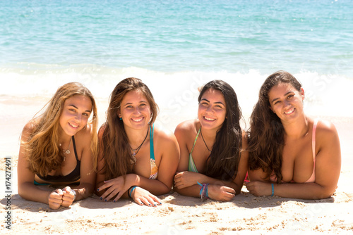 group of friends at the beach © verkoka