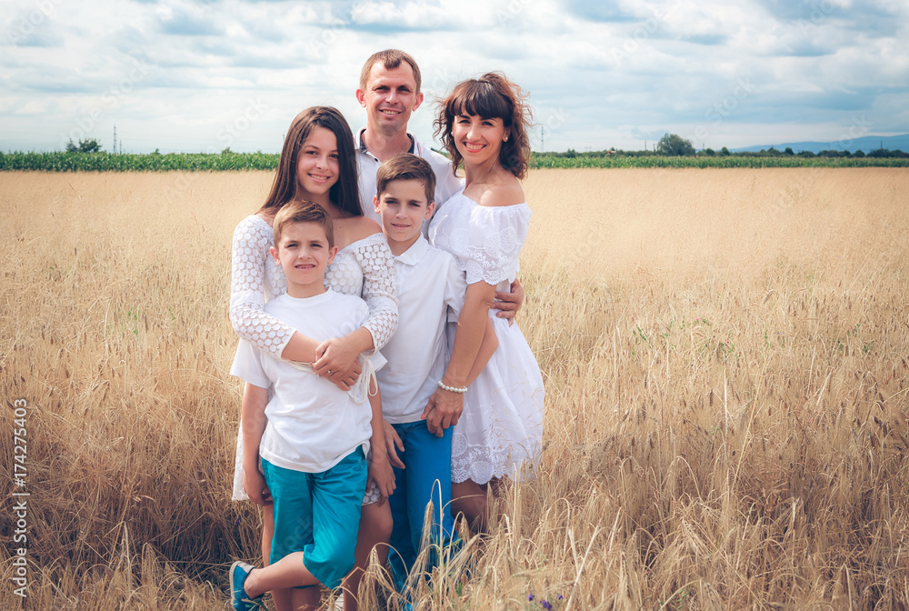 happy family in the field of wheat happy family in the field of wheat