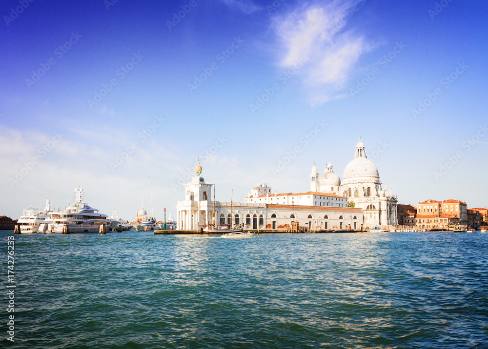 view of Basilica Santa Maria della Salute and Dogana, old custom house, old town of Venice, Italy, retro toned