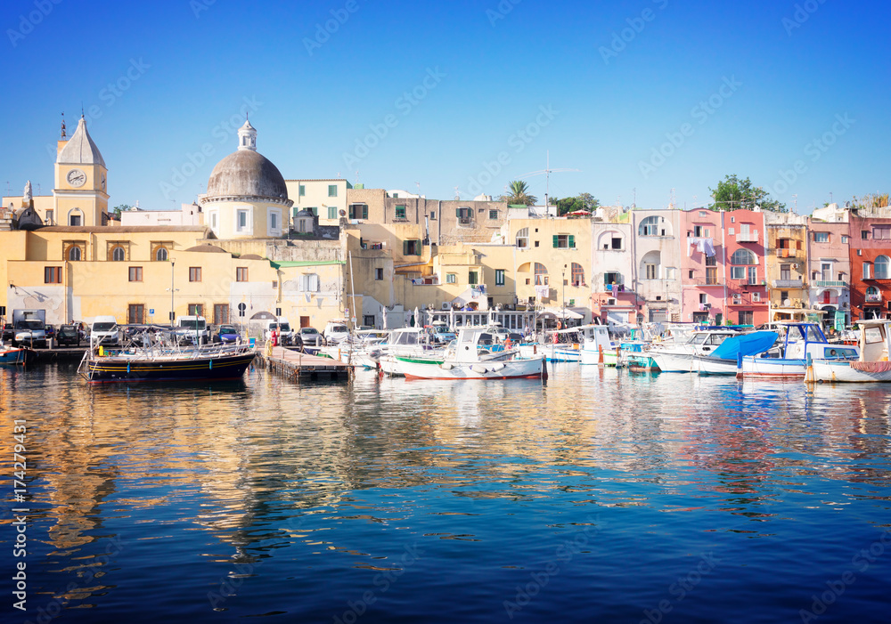 Port with colorful old houses of Procida island, Italy, retro toned
