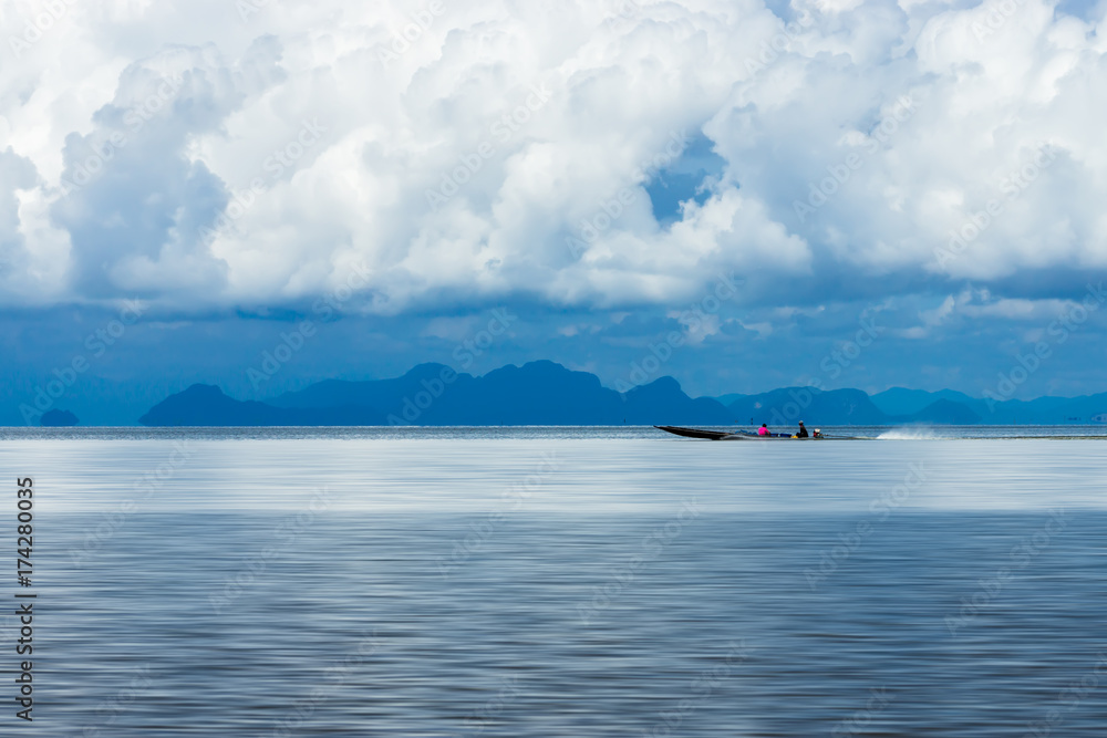 Fishing boat on the lake with White cloud. Fishing boat on the lake with White cloud.