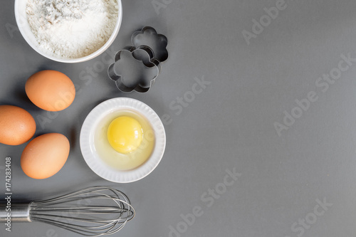 Eggs, flour, rolling pin, shape, corolla, baking ingredients with a copy of a stretch in a vintage style