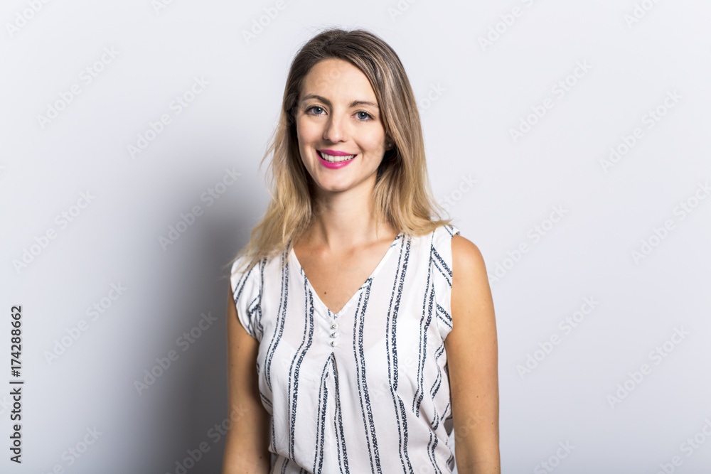 Young Woman Leaning Against Gray Wall Background Young Woman Leaning Against Gray Wall Background