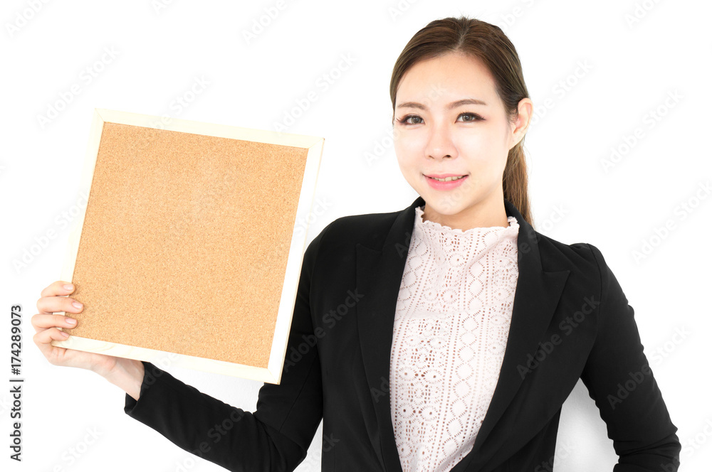 Asian beauty woman in working suit present data on board on white background