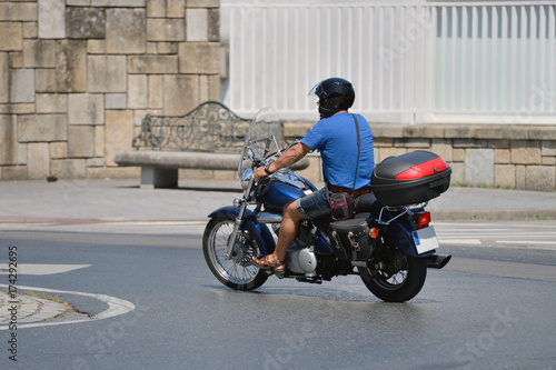 motorcyclist on the road in the city