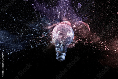  traditional electric bulb explodes  fragments glass  high-speed time