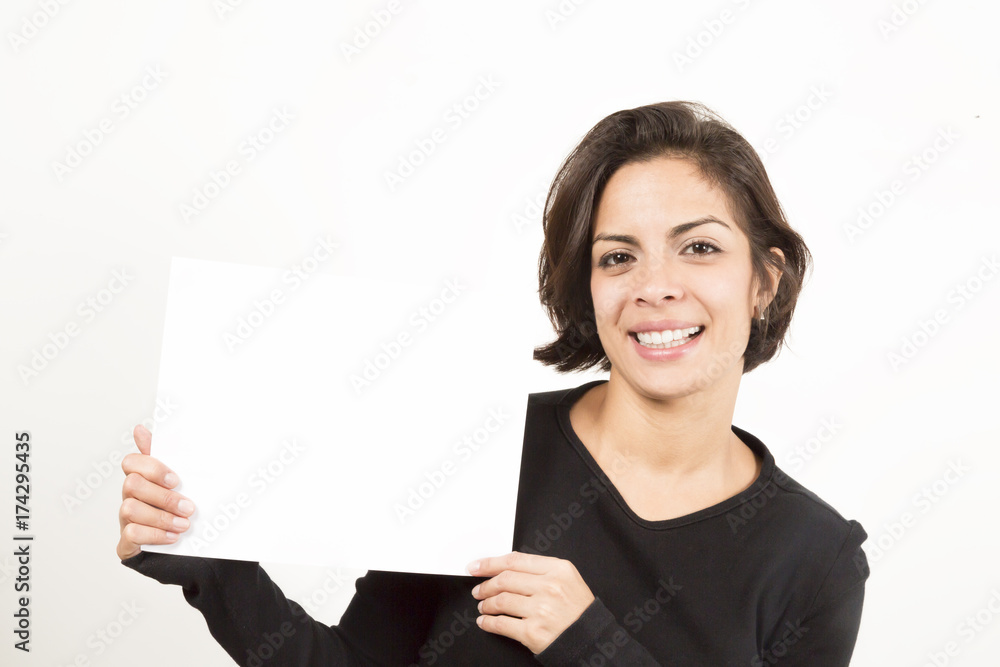 Beautiful young woman holding a blank sheet of paper Beautiful young woman holding a blank sheet of paper