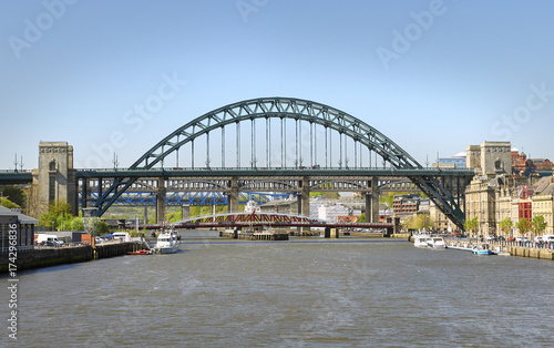 NEWCASTLE UPON TYNE, ENGLAND, UK - MAY 17, 2017: The iconic Tyne Bridge over the River Tyne at Newcastle & Gatesheads Quayside. © Duncan Andison