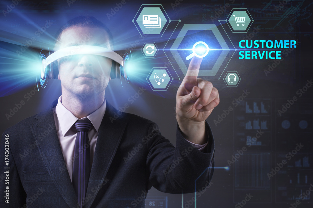 Business, Technology, Internet and network concept. Young businessman working in virtual reality glasses sees the inscription: Customer service Business, Technology, Internet and network concept. Young businessman working in virtual reality glasses sees the inscription: Customer service
