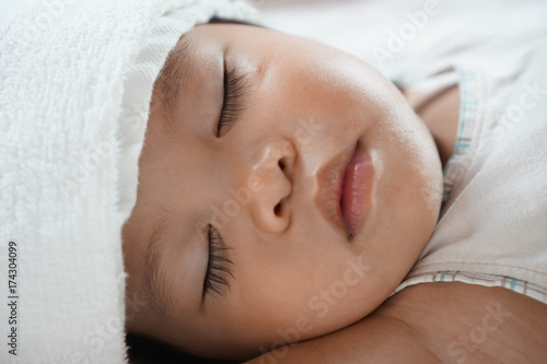 Wallpaper Mural Toddler asian girl sleeping 1.8 years old portrait, child sleep tight day time, recuperation because of sickness Torontodigital.ca